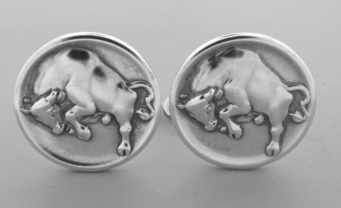 VINTAGE GEORG JENSEN STERLING SILVER TAURUS CUFFLINKS: GEORG JENSEN STERLING SILVER CUFFLINKS Georg Jensen sterling silver Taurus-bull Cufflinks Face measures 0.82" in diameter Vintage, Pre-owned in good condition, minor wear, please refer to pics Stamped