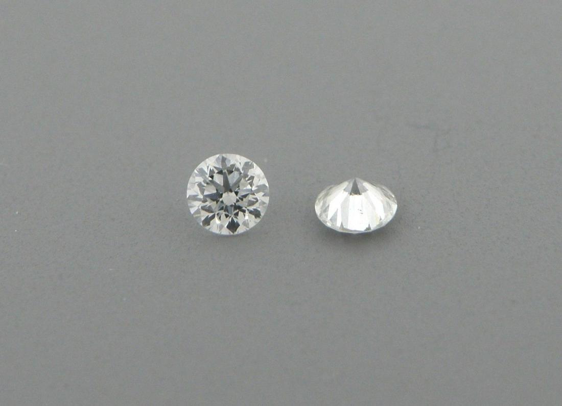 2.2mm MATCHING PAIR ROUND UNTREATED DIAMOND G VS2 (1 of 1)