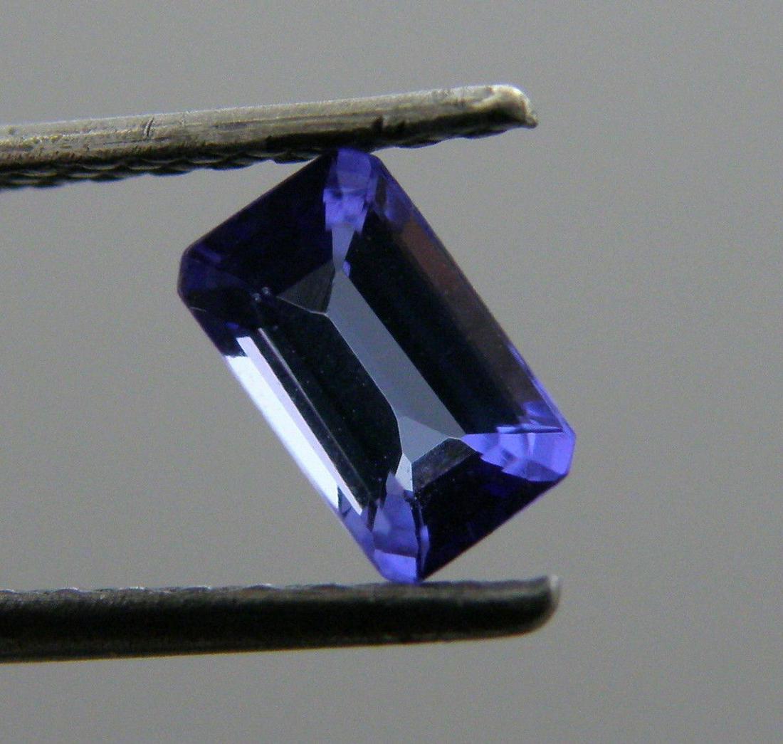 5x3mm NATURAL LOOSE EMERALD CUT PURPLE TANZANITE: LOOSE NATURAL EMERALD CUT TANZANITE Sale is for 1 natural purple tanzanite Measures 5x3mm Emerald cut Please refer to pics for clarity and condition
