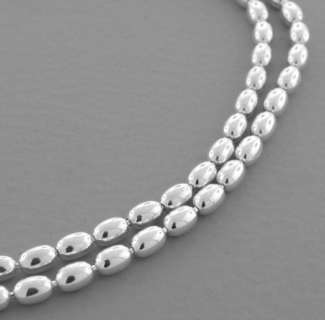 OVAL BEAD CHAIN STERLING SILVER NECKLACE 3mm - 20": NEW STERLING SILVER OVAL BEAD CHAIN NECKLACE New sterling silver oval bead chain necklace Measures 3mm wide Length is 20" Well made chain Lobster clasp Sterling silver 925, polished finish Chain is Ne