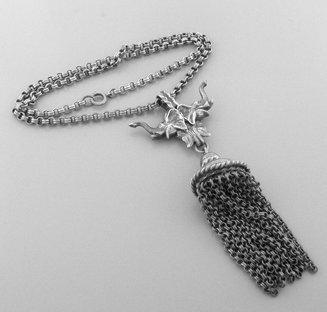 VINTAGE NAPIER STERLING SILVER ELEPHANT DANGLE NECKLACE: VINTAGE STERLING SILVER NECKLACE Vintage sterling silver elephant pendant necklace Chain Measures 18" Pendant measures 4.25" Long Vintage, Pre-owned, in good condition, please refer to pics Stamped NA