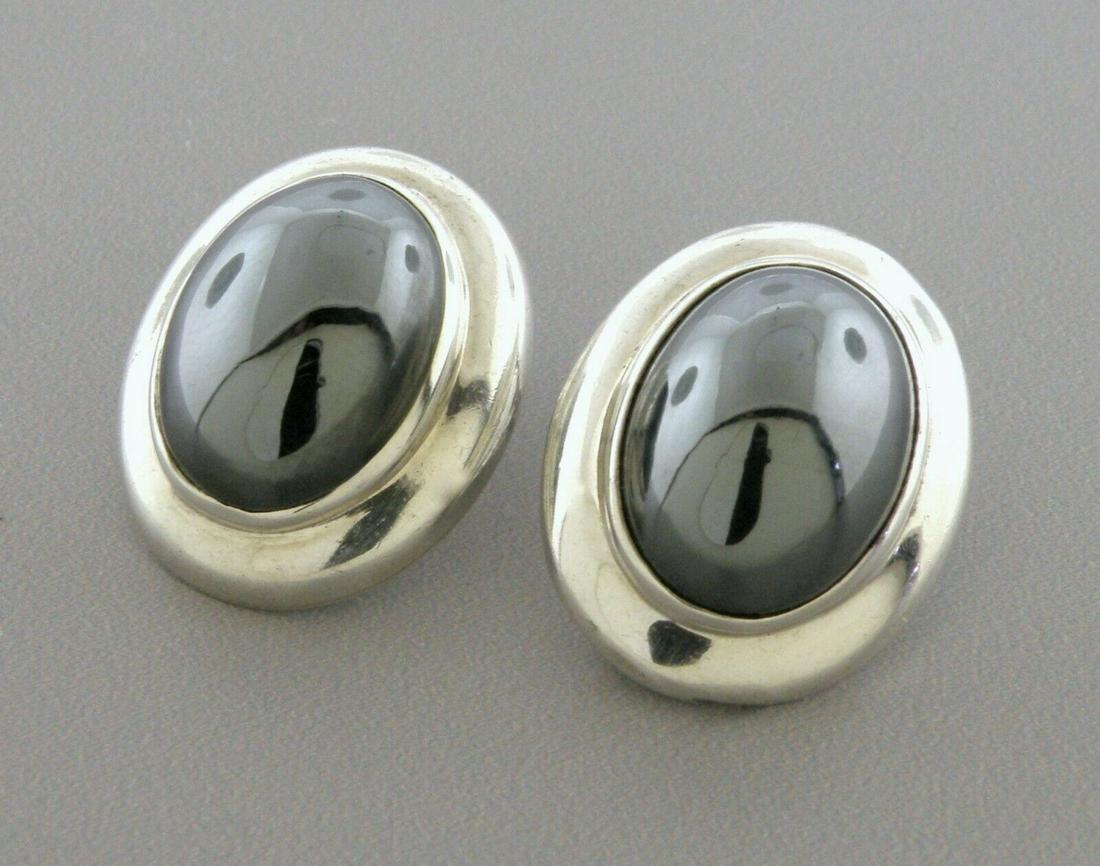 VINTAGE TIFFANY & Co. STERLING SILVER CABACHON HEMATITE EARRINGS: TIFFANY & Co. STERLING SILVER EARRINGS Earrings measure 0.86" H x 0.71" W Tiffany & Co. Sterling silver cabochon hematite earrings Vintage Pre-owned in good condition, please refer to pics Clip on bac