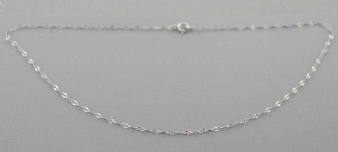 NEW 14K WHITE GOLD CABLE CHAIN ANKLET CHAIN, 11" LONG: 14K WHITE GOLD CABLE 11" ANKLETAnklet measures 11" Long x 1.2mm Wide14K White gold chainNew, in excellent condition, please refer to picsStamped 585Total weight 0.3 grams