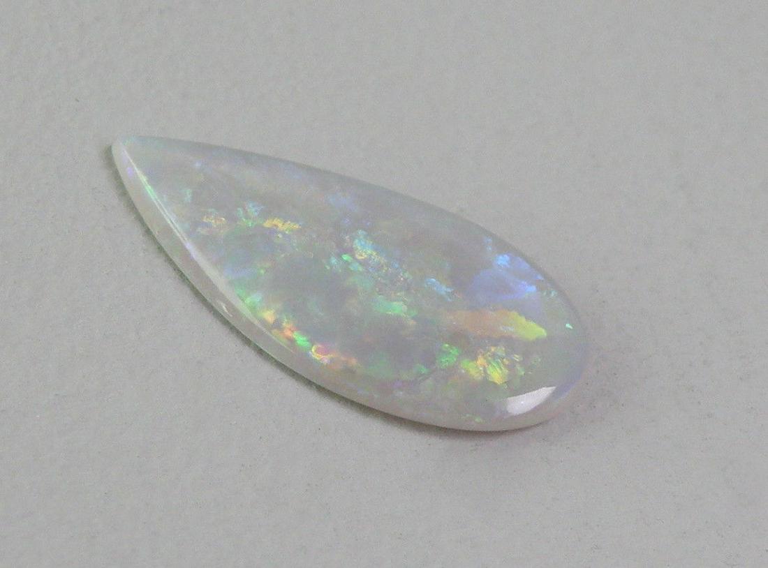 1.62ct NATURAL BLACK AUSTRALIAN MULTI COLORED PEAR OPAL (1 of 2)