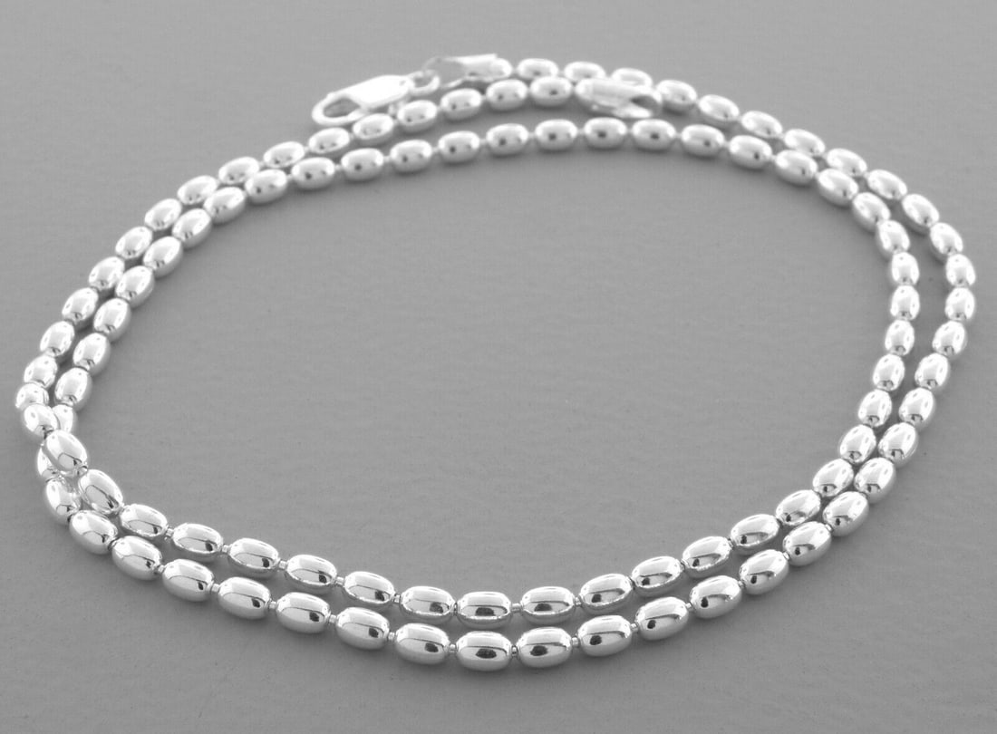 OVAL BEAD CHAIN STERLING SILVER NECKLACE 3mm - 18": NEW STERLING SILVER OVAL BEAD CHAIN NECKLACE New sterling silver oval bead chain necklace Measures 3mm wide Length is 18" Well made chain Lobster clasp Sterling silver 925, polished finish Chain is Ne