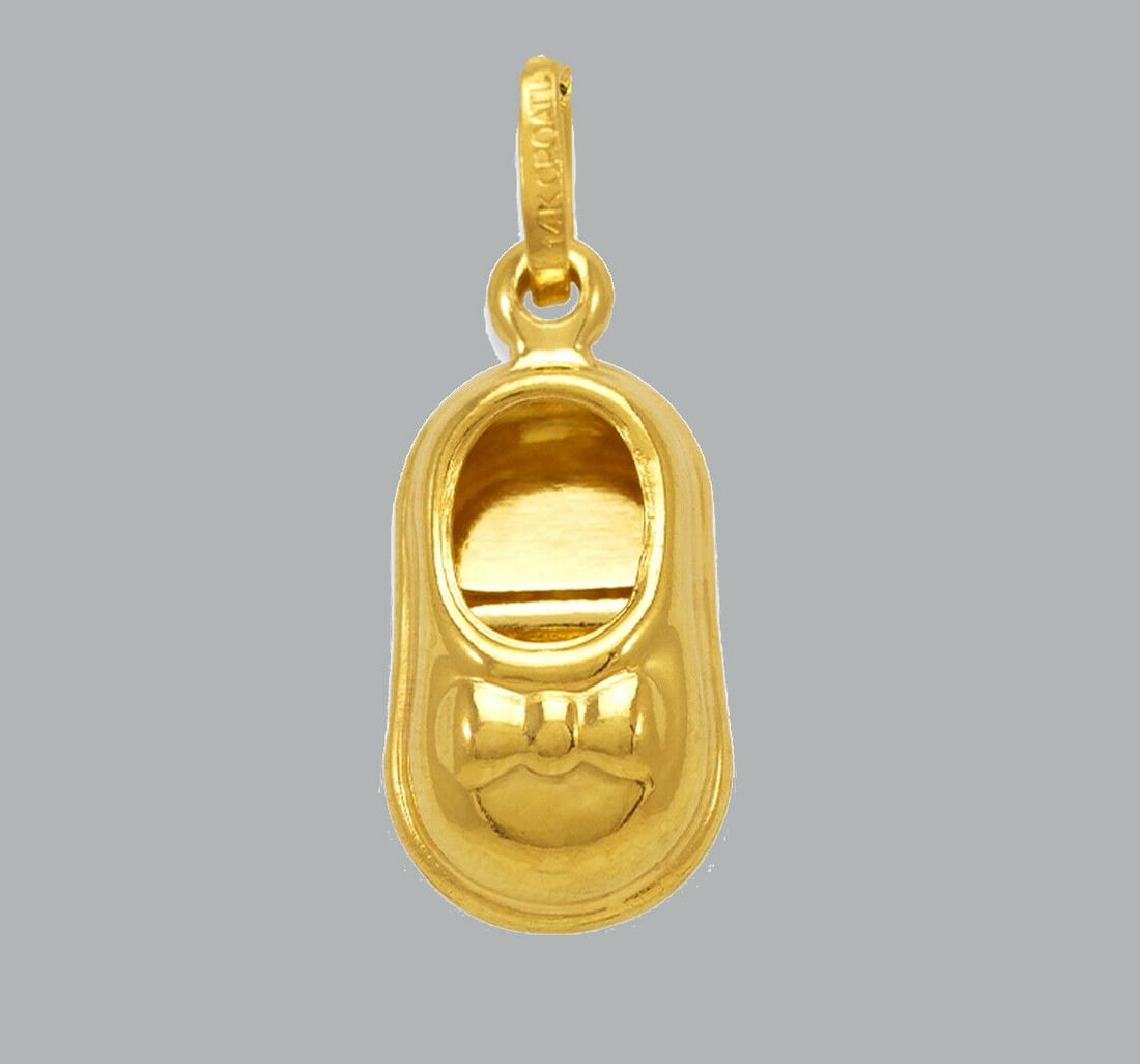 NEW 14K YELLOW GOLD BABY SHOE PENDANT / CHARM: NEW 14K YELLOW GOLD PENDANT New 14K Yellow Gold Pendant Measures: 9mm x 16mm Pendant has a polished finish Pendant is hollow Stamp: 14k Apx Weight: 1.2g