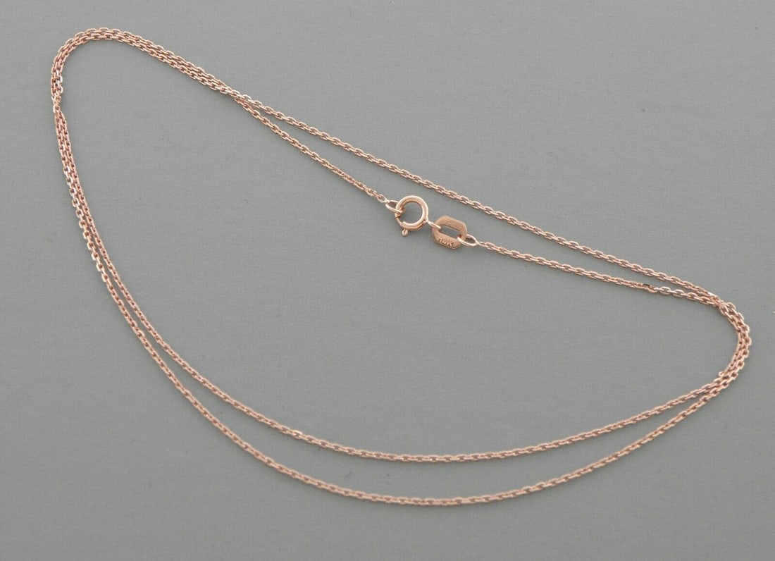 NEW 14K ROSE GOLD CABLE CHAIN NECKLACE: 14K ROSE GOLD CABLE CHAIN NECKLACE 14K Solid Rose Gold (not gold plated or gold filled) 1mm wide Measures 18" Well made chain spring clasp 14K Rose Gold, polished finish Chain is New Avg weight is 1mm