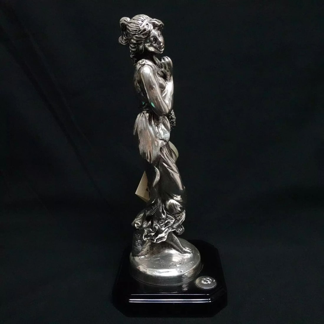 Preziosi D'Arte Emyl Sere Hand Cast Marble Silver Overlay Woman Statue - 9.5": Preziosi D'Arte Emyl Sere Hand Cast Marble Silver Overlay Woman Statue with Black Wood Base Original Tag Included Height - 9.5" Length - 3" Base Width - 4" Total Weight - 1 LB 2.7 Oz Tag Translation "
