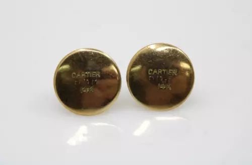 Vintage Cartier 14K Yellow Gold Button Tuxedo Shirt Stud Set of 2: Description Vintage Cartier 14K Yellow Gold Button Tuxedo Shirt Stud Set of 2 The tuxedo / shirt buttons are in good condition. May show signs of wear and/or tear. Approximate Measurements Button thic