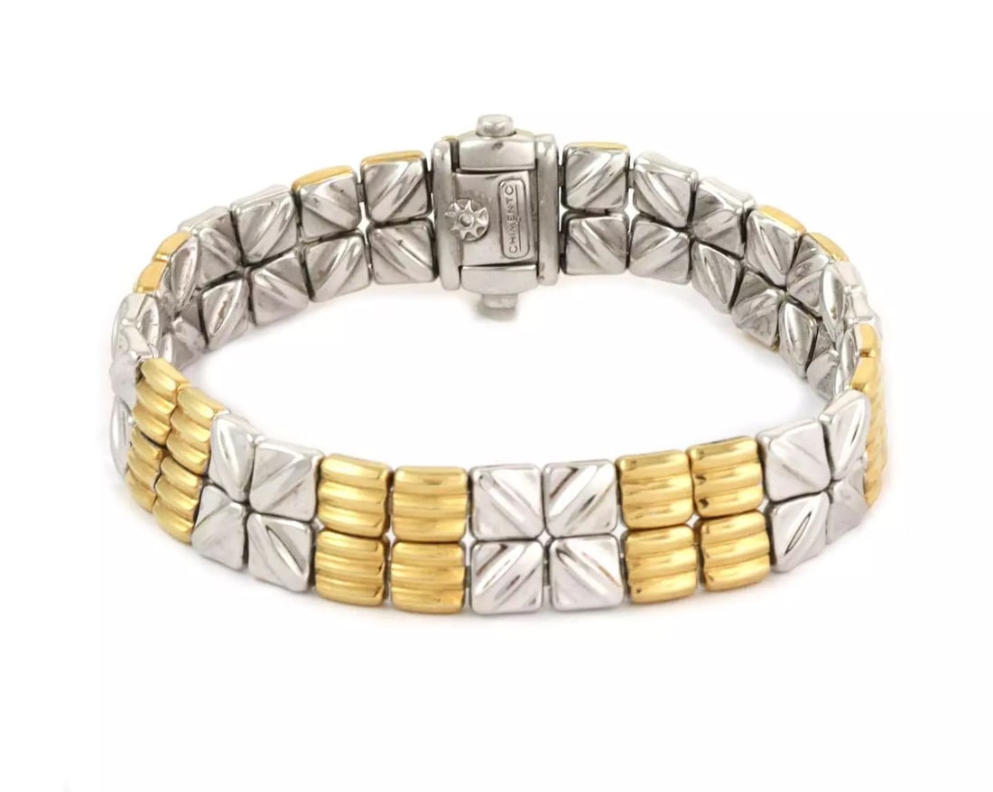 CHIMENTO BRACELET 18K TWO TONE GOLD FANCY FLOWER STYLE 12MM WIDE ITALIAN: Chimento 18k Two Tone Gold Fancy Flower Style 12mm Wide Bracelet Description This is an elegant bracelet from Chimento, it is crafted from 18k yellow and white gold with a polished finish and features
