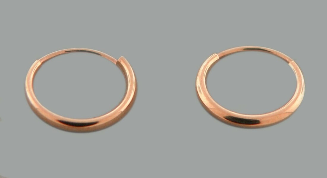 NEW 14K ROSE GOLD SMALL ROUND TUBE HOOP EARRINGS: NEW 14K ROSE GOLD EARRINGS New 14K Rose Gold Hoop Earrings Measures: 1.2mm Wide x 10mm in Diameter Earrings have a polished finish Endless Back Stamp: 14k Avg Weight: 0.3g