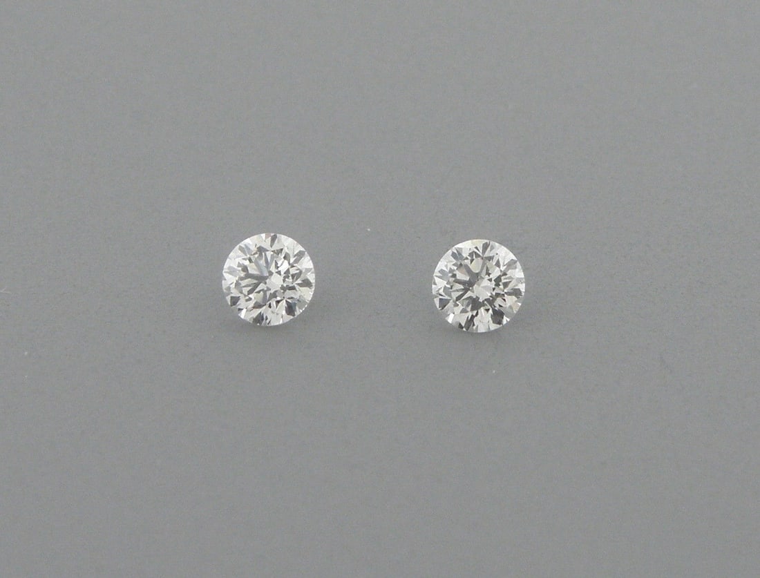 1.8mm MATCHING PAIR ROUND CUT DIAMOND G VS2: Sale is for 2 round cut natural untreated earth mined diamond Sale is for a matching pair Diamonds measures 1.8mm in diameter Diamonds are full cut Diamonds are G color VS2-SI1 quality New, never used