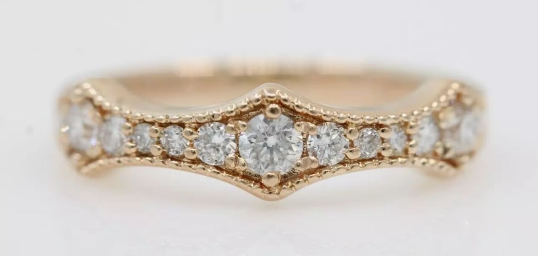 14K ROSE GOLD GSI 0.50 TCW NATURAL DIAMOND BAND RING SIZE 5 - 3.3 GRAMS: 14K ROSE GOLD GSI 0.50 TCW NATURAL DIAMOND BAND RING SIZE 5 - 3.3 GRAMS Description 14K Rose Gold GSI 0.50 TCW Natural Diamond Band Ring Item is in good condition. May show signs of wear. APPROXIMATE