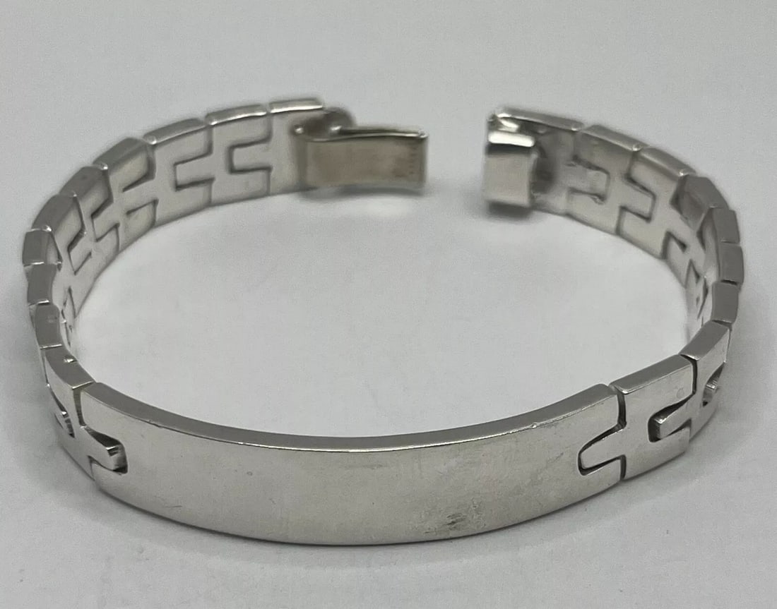 STERLING SILVER 8" ENGRAVEABLE ID BRACELET: This sterling silver bracelet is a timeless piece of jewelry that can be personalized with your own message. With a length of 8 inches, it is perfect for everyday wear and makes a great gift for yours