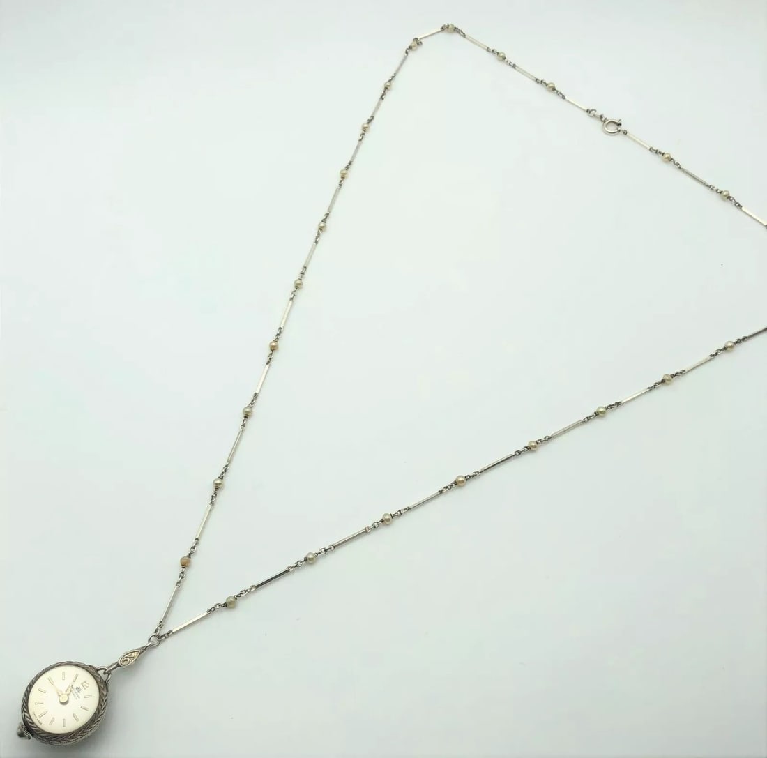 Bucherer 17 Jewels Watch Ball style Link Necklace with Pearls (26 inches): BUCHERER 17 JEWELS WATCH BALL STYLE LINK NECKLACE WITH PEARLS (26 INCHES) Bucherer 17 Jewels Watch Ball style Link Necklace with Pearls You are bidding on a Bucherer 17 Jewels Watch Ball style Link Ne