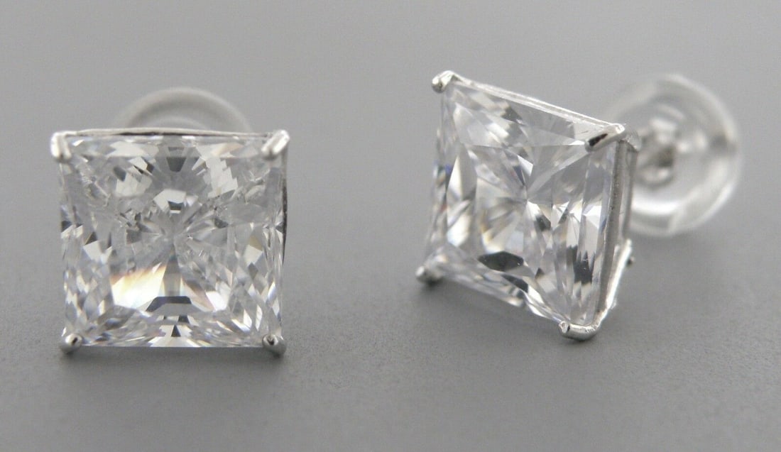 14K WHITE GOLD STUD PRINCESS CUT CZ EARRINGS 5MM: NEW 14K WHITE GOLD STUD EARRINGS New 14K white Gold Earrings Measures: 5mm Stud earrings with cubic zirconia Earrings have a polished finish Princess Cut & Push Backs Stamp: 14k