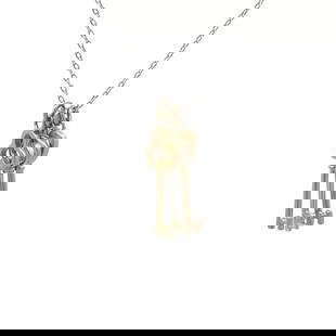 TIFFANY & CO. TRIPLE KEYS GOLD PENDANT 18K GOLD STERLING SILVER W/CHAIN: TIFFANY & CO. TRIPLE KEYS GOLD PENDANT 18K GOLD STERLING SILVER W/CHAIN This is authentic triple mini pendants and chain necklace from Tiffany & Co. The chain and white key are crafted from sterling s