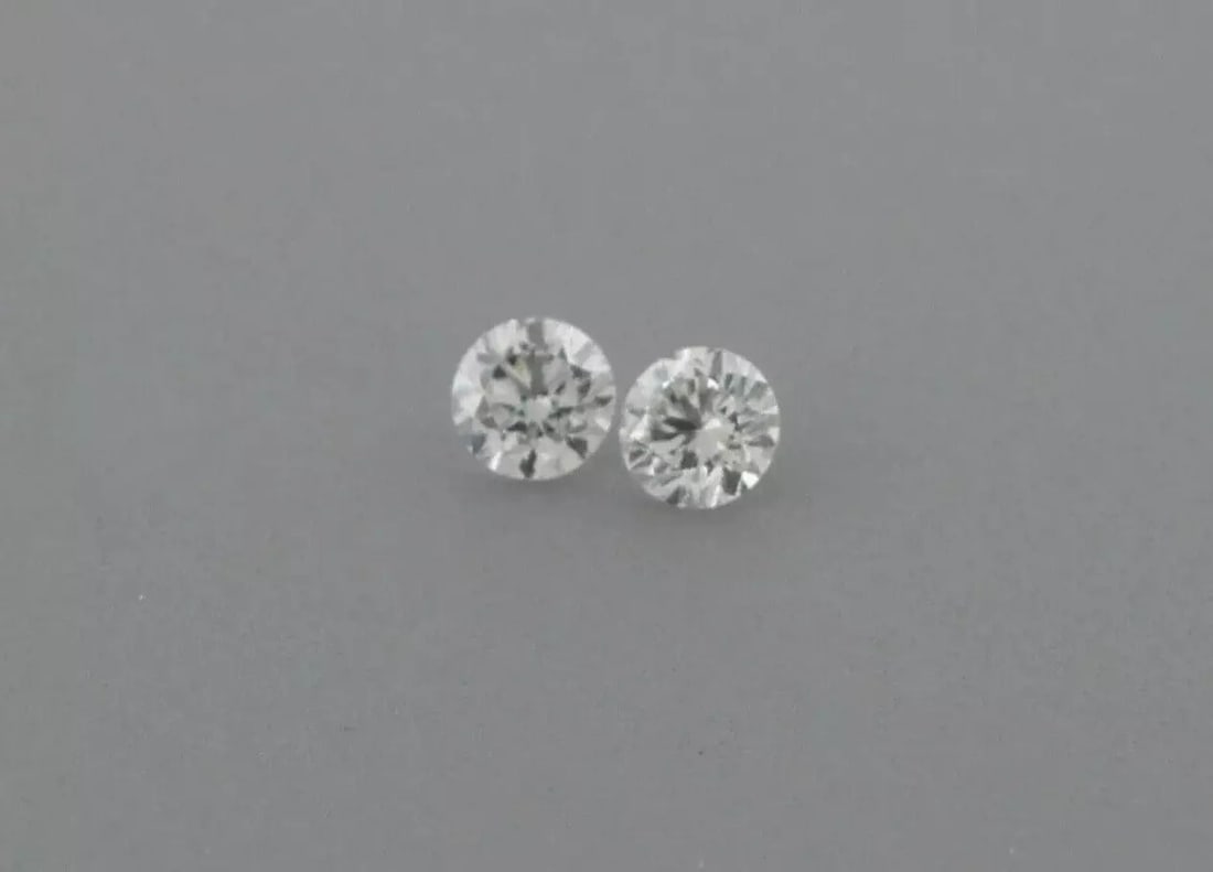 LOOSE NATURAL UNTREATED DIAMONDS Sale is for 2 round cut natural untreated earth mined diamond Sale: LOOSE NATURAL UNTREATED DIAMONDS Sale is for 2 round cut natural untreated earth mined diamond Sale is for a matching pair Diamonds measures 0.8mm in diameter Diamonds are full cut Diamonds are G colo