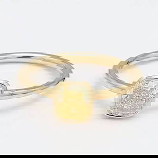 TIFFANY & CO. 0.90 CARAT INTENSE FANCY YELLOW DIAMOND 18K YG ENGAGEMENT RING: TIFFANY & CO. 0.90 CARAT INTENSE FANCY YELLOW DIAMOND 18K YG ENGAGEMENT RING Designer: Tiffany & Co Title: Tiffany & Co 0.90 Carat Cushion Brilliant Intense Fancy Yellow VS2 Diamond 18 Karat Yellow Go