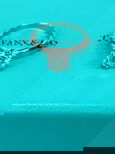 TIFFANY AND CO 1.01 CARAT I-VS1 PLATINUM DIAMOND ENGAGEMENT RING WITH CERT: TIFFANY AND CO 1.01 CARAT I-VS1 PLATINUM DIAMOND ENGAGEMENT RING WITH CERT Brand: Tiffany & Co. Type: Ring Color: I (GIA has certified it for H color) Clarity: VS1 Precision of cut: Very Good Symmetry