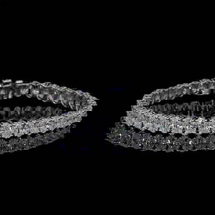 LAB-GROWN 7 CARAT OVAL F-VS2 DIAMOND 14K WHITE GOLD TENNIS BRACELET: LAB-GROWN 7 CARAT OVAL F-VS2 DIAMOND 14K WHITE GOLD TENNIS BRACELET 47Jewelry 47Jewelry Lab-Grown 7 Carat Oval F-VS2 Diamond 14K White Gold Tennis Bracelet Details Department Unisex Adults Main Stone