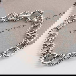 DAVID YURMAN STERLING SILVER 10MM OVAL LINK CHAIN BRACELET 7.5" LONG: David Yurman Chain Collection for Women Sterling Silver Oval Link Chain Bracelet Size - 7.5" Long Fits up to Relax 6 - 6.5" Snug Wrist Fit Chain Width - 10mm Est. Retail - $395 USD Style # DC0133 SS75