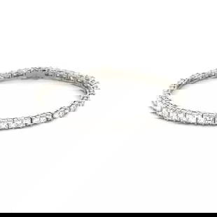 DIAMOND TENNIS BRACELET SQUARE CUT SHARED PRONGS IN PLATINUM 7.5 CARAT ESTATE: DIAMOND TENNIS BRACELET SQUARE CUT SHARED PRONGS IN PLATINUM 7.5 CARAT ESTATE From platinum with a polished finish, the rectangle frame section link tennis bracelet has a set of 2 square shape diamond
