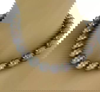 TAHITIAN PEARL NECKLACE GRADUATED GOLD DIAMOND SINGLE STRAND 10-15MM: TAHITIAN PEARL NECKLACE GRADUATED GOLD DIAMOND SINGLE STRAND 10-15MM Tahitian Graduated Gray Pearls Diamond 18k Single Strand Necklace Description This is a charming pearls and diamond necklace, the s