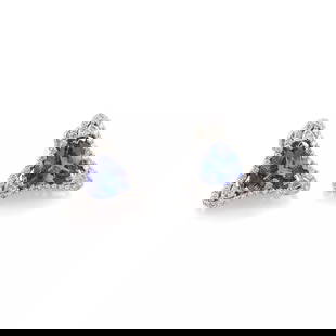 ESTATE 8.00CT TANZANITE DIAMOND 14K WHITE GOLD FANCY TRIANGLE STUD EARRINGS: ESTATE 8.00CT TANZANITE DIAMOND 14K WHITE GOLD FANCY TRIANGLE STUD EARRINGS Estate 8.00ct Tanzanite Diamond 14k White Gold Fancy Triangle Stud Earrings Description This is a gorgeous pair of large stu