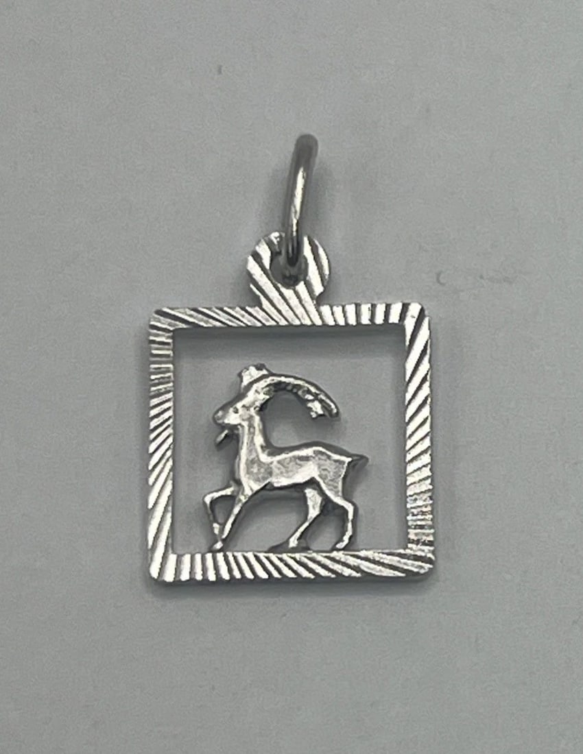 CAPRICORN STERLING SILVER CHARM: CAPRICORN STERLING SILVER CHARM
