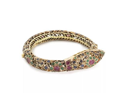 SNAKE BRACELET RUBY EMERALD & SAPPHIRE 9KT YELLOW GOLD: SNAKE BRACELET RUBY EMERALD & SAPPHIRE 9KT YELLOW GOLD Vintage Ruby Emerald & Sapphire 9kt Yellow Gold Snake Bracelet Description This gorgeous vintage bracelet is crafted from 9k yellow gold, it feat