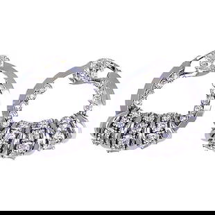 BOUCHERON DOOR KNOCKER EARRINGS DIAMOND PLATINUM FRENCH ESTATE JEWELRY: BOUCHERON DOOR KNOCKER EARRINGS DIAMOND PLATINUM FRENCH ESTATE JEWELRY BOUCHERON Platinum Diamond Earrings A gorgeous pair of vintage Boucheron door knocker earrings, crafted of platinum and diamond.