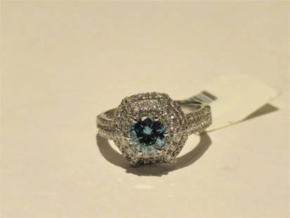 18KT GORGEOUS BLUE DIAMOND WHITE DIAMOND WEB RING: 18KT GORGEOUS BLUE DIAMOND WHITE DIAMOND WEB RING LAST CALL, LAST CHANCE!! LIQUIDATION SALE!! The Following Item we are offering is this Beautiful Rare Important 18KT Gold Certified Brilliant Fancy Bl