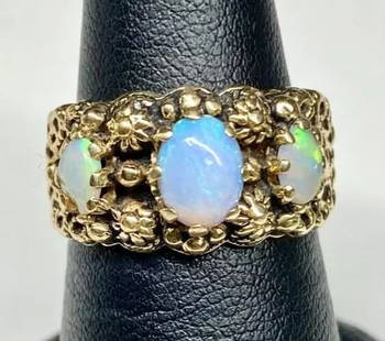 WOMEN'S 14K YELLOW GOLD RING WITH GENUINE OPAL: WOMEN'S 14K YELLOW GOLD RING WITH GENUINE OPAL Women's 14k Yellow Gold Ring with Genuine Opal You are bidding on a pre-owned Women's 14k Yellow Gold Ring with Genuine/Natural Opal. The ring has minor