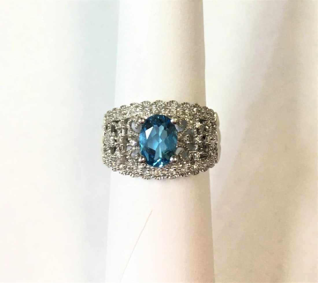 14K WHITE GOLD FILIGREE STYLE RING WITH CENTER OVAL BLUE TOPAZ AND DIAMONDS (1 of 2)