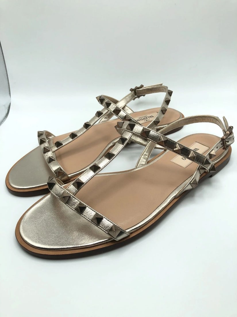 VALENTINO GARAVANI SILVER ROCKSTUD T STRAP STUDDED FLAT HEEL SANDALS (SIZE: 38) (1 of 2)