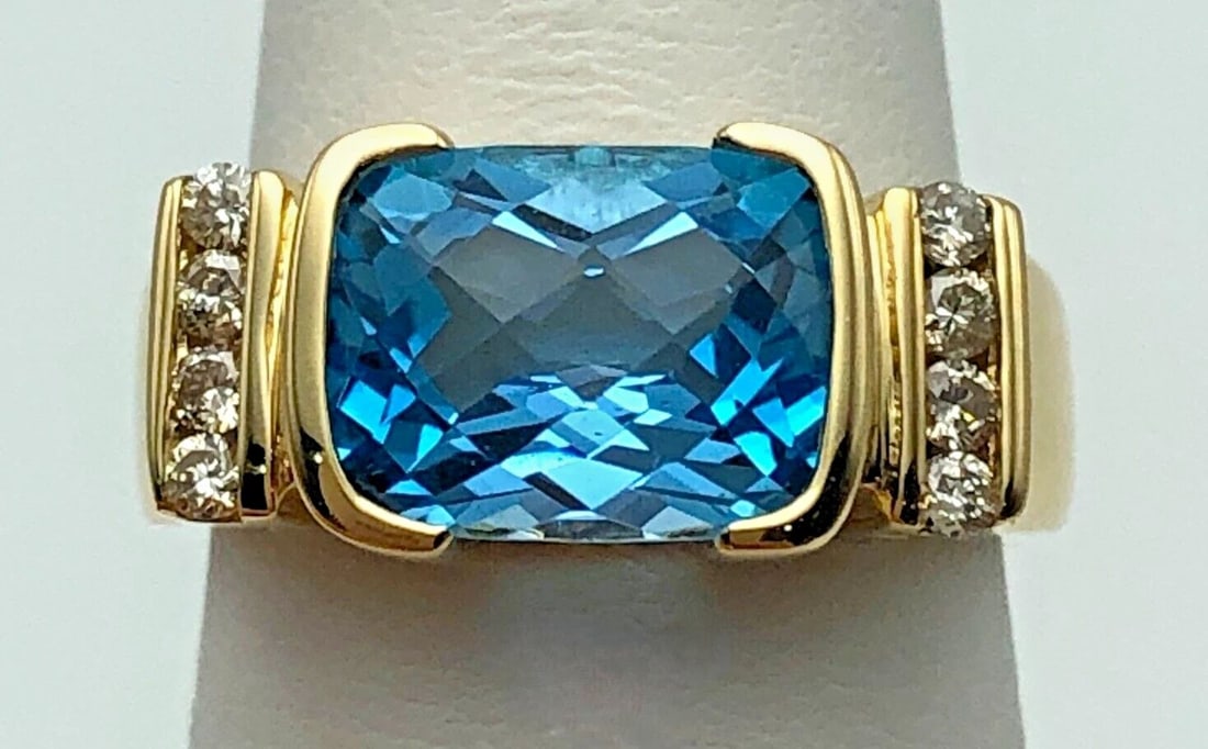 14K GOLD RING SET WITH SWISS BLUE TOPAZ AND 0.16CTS OF DIAMONDS SIZE: 6.25 (1 of 2)