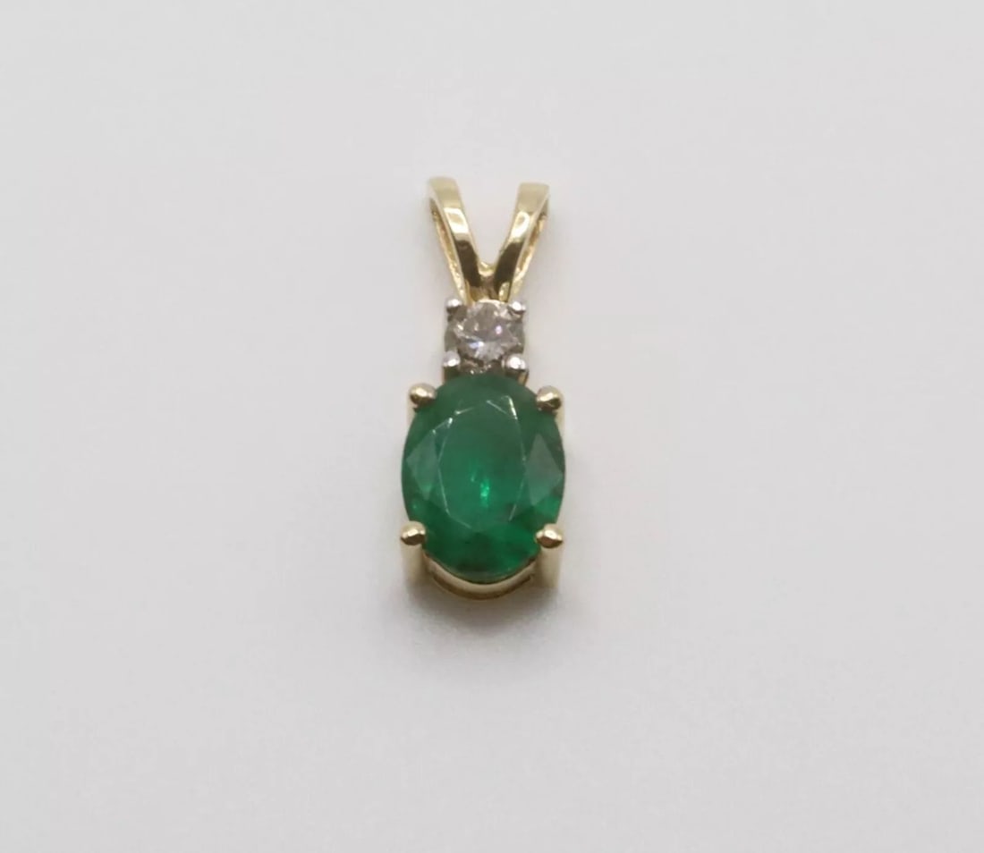 14K YELLOW GOLD PENDANT WITH CENTER 1CT EMERALD AND UPPER 0.11CT DIAMOND (1 of 2)