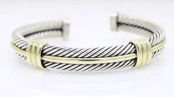 DAVID YURMAN 14K YELLOW GOLD & STERLING SILVER DOUBLE CABLE CUFF BRACELET 6.5": DAVID YURMAN 14K YELLOW GOLD & STERLING SILVER DOUBLE CABLE CUFF BRACELET 6.5" Description David Yurman 14K Yellow Gold & Sterling Silver Double Cable Cuff Bracelet The bracelet is in great condition.