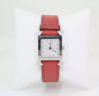 HERMES H WATCH HH1.210 STAINLESS STEEL 21MM SILVER DIAL RED STRAP W/ BOX & COA: HERMES H WATCH HH1.210 STAINLESS STEEL 21MM SILVER DIAL RED STRAP W/ BOX & COA Description Hermes H Watch HH1.210 Stainless Steel 21mm Silver Dial Red Strap W/ Box and COA Watch is in great working co