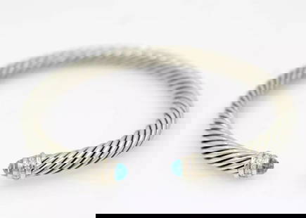 DAVID YURMAN CABLE CLASSIC STERLING SILVER BLUE TOPAZ DIAMOND 5MM CUFF BRACELET: DAVID YURMAN CABLE CLASSIC STERLING SILVER BLUE TOPAZ DIAMOND 5MM CUFF BRACELET Description David Yurman Cable Classic Sterling Silver Blue Topaz Diamond 5mm Cuff Bracelet Item is in great condition.