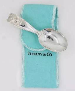 TIFFANY & CO. STERLING SILVER MOTHER GOOSE CURVED HANDLE BABY SPOON W/ POUCH: TIFFANY & CO. STERLING SILVER MOTHER GOOSE CURVED HANDLE BABY SPOON W/ POUCH Description Tiffany & Co. Sterling Silver Mother Goose Curved Handle Baby Spoon w/ Pouch Spoon is in good condition. May sh