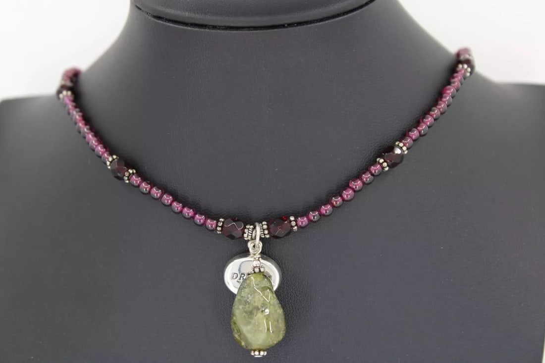 PAIGE WALLACE STERLING SILVER AMETHYST & PERIDOT DREAM 18" NECKLACE: PAIGE WALLACE STERLING SILVER AMETHYST & PERIDOT DREAM 18" NECKLACE Description Paige Wallace Sterling Silver Amethyst & Peridot Dream 18" Necklace Necklace in great condition. May show signs of wear.