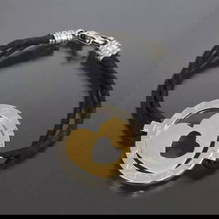 BVLGARI TONDO HEART BRACELET K18 X STEEL: BVLGARI TONDO HEART BRACELET K18 X STEEL E1571 Style : Bracelet Length (Approx.) : 15cm Width (Approx.) : 2mm Charm Size (if any) (Approx.) : 3 x 2.5 cm Material : Yellow Gold 18K Steel Main Stone : N