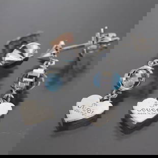 GUCCI BLUE TOPAZ TRADEMARK HEART EARRINGS, AG925 SILVER, SPECIAL PRICE: GUCCI BLUE TOPAZ TRADEMARK HEART EARRINGS, AG925 SILVER, SPECIAL PRICE 4232A Style : Earrings Length (Approx.) : 2.6 cm Width (Approx.) : 8 mm Material : Silver 925 Main Stone : Blue topaz Total weigh