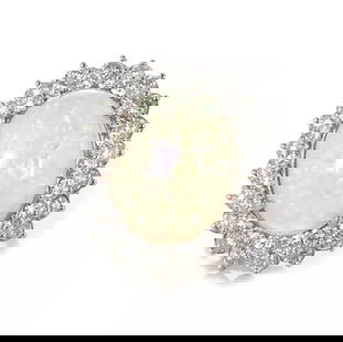 PLATINUM FIRE OPAL DIAMOND OVAL COCKTAIL RING: PLATINUM FIRE OPAL DIAMOND OVAL COCKTAIL RING Fire Opal Diamond Platinum Oval Cocktail Ring Description This is a stunning large Estate ring. It is crafted from platinum featuring a large oval shape f