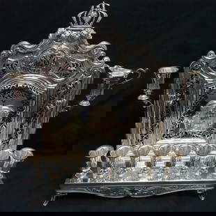 ANTIK STERLING SILVER LEAF ORNATE CHASED CROWN WALL MENORAH - 16" X 12.25": ANTIK STERLING SILVER LEAF ORNATE CHASED CROWN WALL MENORAH - 16" X 12.25" Antik Sterling Silver Leaf Ornate Chased Crown Wall Menorah Height - 16" Length - 12.25" Width - 3.25" Total Weight - 3 Lb. 7