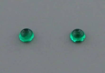 LOOSE NATURAL MATCHING PAIR COLOMBIAN EMERALD Sale is for 2 round cabochon natural Colombian: LOOSE NATURAL MATCHING PAIR COLOMBIAN EMERALD Sale is for 2 round cabochon natural Colombian Emeralds Matching pair Emeralds measures 3mm in diameter Natural New, never used before, perfect for jewelr
