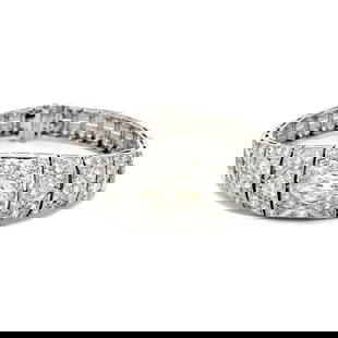 ART DECO DIAMOND BRACELET 5.30CT PLATINUM FILIGREE CENTERPIECE: ART DECO DIAMOND BRACELET 5.30CT PLATINUM FILIGREE CENTERPIECE This stunning Art Deco bracelet features a large centerpiece to tapered band bracelet and it is crafted from platinum. The band tapers of