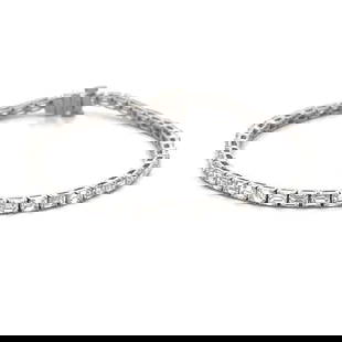 EMERALD CUT TENNIS BRACELET 6.80CT 18K WHITE GOLD NEW: EMERALD CUT TENNIS BRACELET 6.80CT 18K WHITE GOLD NEW This is an eye-catching NEW line tennis bracelet. It is crafted from 18k white gold with a polished finish featuring the entire length of the brac